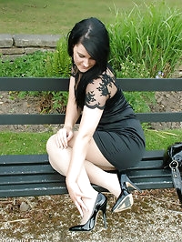 Black hair black stilettos and sexy black nylons