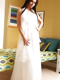 Beautiful bride slips out of her elegant white dress and..
